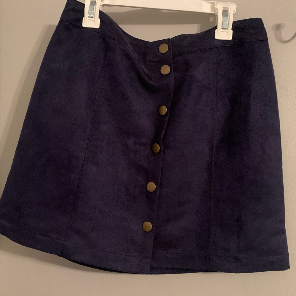 Navy skirt with golden buttons